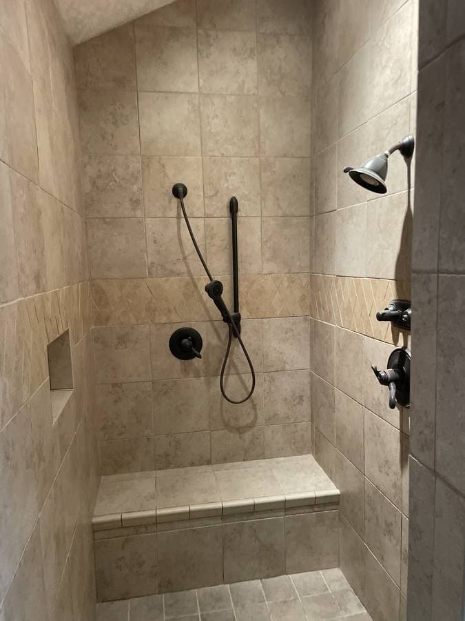 picture of a newly remodeled bathroom with custom tiling