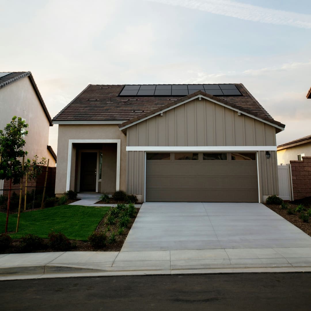 picture of a newly repaired roof with new shingles